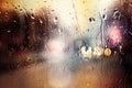 Blurred car lights. Raindrops on the window Royalty Free Stock Photo