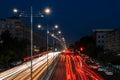 Blurred car traffic light at night city. Traffic jam in evening rush hour. Royalty Free Stock Photo