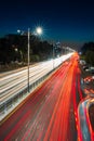 Blurred car traffic light at night city. Traffic jam in evening rush hour. Royalty Free Stock Photo