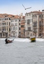 Blurred carabinieri police boat speeds along the Grand Canal of Venice bird in the sky, Italy Royalty Free Stock Photo