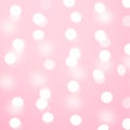Blurred Christmas garland white lights on pink background. New Year decoration. Royalty Free Stock Photo
