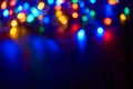 Blurred christmas lights on dark background Royalty Free Stock Photo