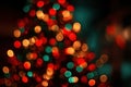 Blurred Christmas Tree Lights with Red and Green Bokeh in High-Resolution Royalty Free Stock Photo