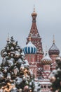 Blurred christmas trees in Red Square, Moscow. Christmas trees and background of St Basil Cathedral Royalty Free Stock Photo