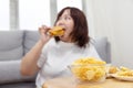 Blurred Chubby Woman Enjoy Eatting Beef Cheese Burger