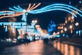 Blurred city with christmas lights at night. New Year bokeh Royalty Free Stock Photo