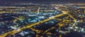 Blurred city lights bokeh. Aerial view urban night light bokeh. Royalty Free Stock Photo