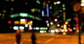 Blurred city lights create a vibrant backdrop at night Royalty Free Stock Photo