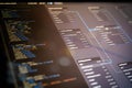 Blurred close-up of SQL database structure with source code and ER diagram on screen. Royalty Free Stock Photo