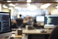 Blurred coding workspace with screens and code Royalty Free Stock Photo