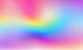 Blurred colored abstract background. Smooth transitions of iridescent colors. Colorful gradient. Rainbow backdrop