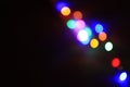 Blurred colourful light black background