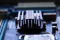 Blurred computer motherboard closeup in tilt shift style with selective focus. Defocused computer parts background Royalty Free Stock Photo