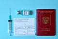 Blurred COVID-19 Vaccination Record card  Passport of a Russian citizen. Immune passport or certificate for Royalty Free Stock Photo