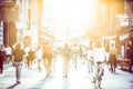 Blurred crowd of people on Copova pedestrian street in Ljubljana at sunset. Urban lifestyle and mobility concept.