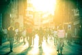 Blurred crowd of people on Copova pedestrian street in Ljubljana at sunset. Urban lifestyle and mobility concept.