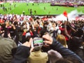 Blurred crowd of spectators on stadium