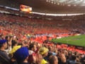 Blurred crowd of spectators on stadium