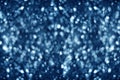 Blurred dark blue shiny glitter bokeh background, defocused soft blue silver shimmer backdrop design Royalty Free Stock Photo