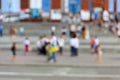 Blurred defocused abstract background of people walking on the city street. Unrecognizable faces Royalty Free Stock Photo