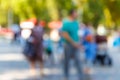 Blurred defocused abstract background of people walking on the city street. Unrecognizable faces Royalty Free Stock Photo