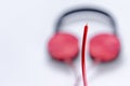 Blurred defocused broken red headphones