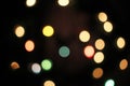 Blurred defocused christmas light lights bokeh background. Colorful red yellow blue green de focused glittering pattern Royalty Free Stock Photo