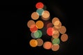 Blurred defocused christmas light lights bokeh background. Colorful red yellow blue green de focused glittering pattern Royalty Free Stock Photo