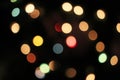 Blurred defocused christmas light lights bokeh background. Colorful red yellow blue green de focused glittering pattern Royalty Free Stock Photo