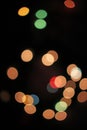 Blurred defocused christmas light lights bokeh background. Colorful red yellow blue green de focused glittering pattern Royalty Free Stock Photo