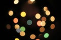 Blurred defocused christmas light lights bokeh background. Colorful red yellow blue green de focused glittering pattern Royalty Free Stock Photo