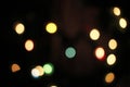 Blurred defocused christmas light lights bokeh background. Colorful red yellow blue green de focused glittering pattern Royalty Free Stock Photo