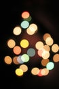 Blurred defocused christmas light lights bokeh background. Colorful red yellow blue green de focused glittering pattern Royalty Free Stock Photo