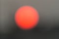 Blurred And Defocused Image Of The Sun At Dawn In The City, Abstract Background With Copy Space