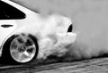 Blurred of drift car, Car wheel drifting and smoking Royalty Free Stock Photo