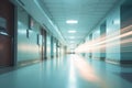 Blurred empty modern hospital corridor background. Abstract blurred clinic hallway interior. Entrance of medical emergency room in Royalty Free Stock Photo