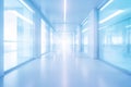 Blurred empty modern hospital corridor background. Abstract blurred clinic hallway interior. Entrance of medical emergency room in Royalty Free Stock Photo