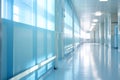 Blurred empty modern hospital corridor background. Abstract blurred clinic hallway interior. Entrance of medical emergency room in Royalty Free Stock Photo