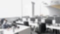 Blurred empty open space office. Abstract light bokeh at office interior background for design Royalty Free Stock Photo
