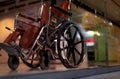 Blurred empty wheelchair near lift in private hospital for service patient and disabled people. Medical equipment in hospital for Royalty Free Stock Photo