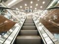 Blurred escalators at modern shopping mall Royalty Free Stock Photo