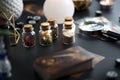 Blurred esoteric magic objects tarot cards on witch table altar