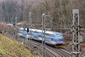 Blurred fast driving Czech train with railroad using motion blur effect