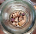 Closeup of wine corks inside glass bottle. Wine bar backdrop Royalty Free Stock Photo