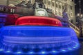 Blurred fountain waters with Czech flag colors in Wenceslas Square, Prague