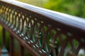 Blurred fragment of forged decorative railing. Close-up