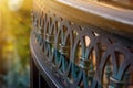 Blurred fragment of forged decorative railing. Close-up