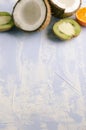 Blurred fresh healthy fruit in the back, blue backgound.Vertica shotwit copy space Royalty Free Stock Photo