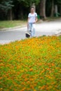 Blurred girl on the background flowers.