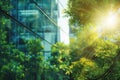 Blurred glass walls of an office building among greenery. Eco-friendly business center with green environment for oxygen